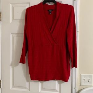 Red blouse.